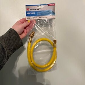 New never opened Yellow Whip Hose